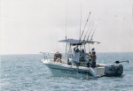 Capt. Jerry hoists the Raleigh Saltwater Sportfishing Club King Mackerel Tournament winning 47.65 pound king over the side.