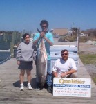 The little lady on the left, Tess Carota, caught this 75 pound king.