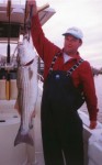 Mike Webb with a 20 pound Hatteras Striper.